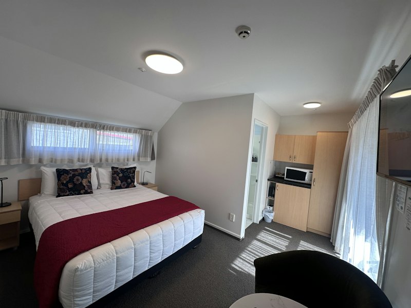 Compact Studio with queen bed and kitchenette