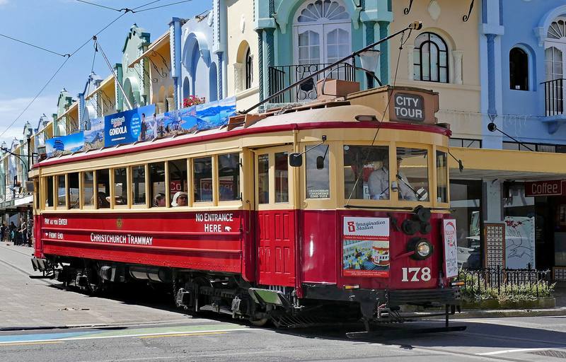 A red heritage tram on New Regent Street, Christchurch