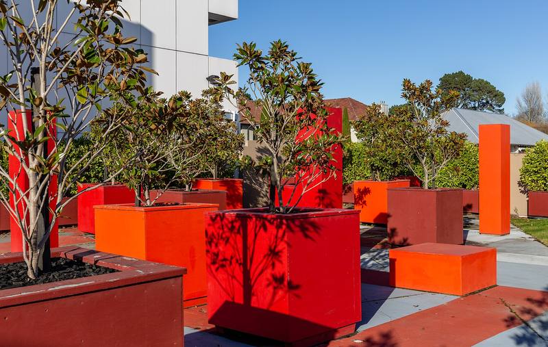 Red planters and trees at the top of Victoria Street, Christchurch